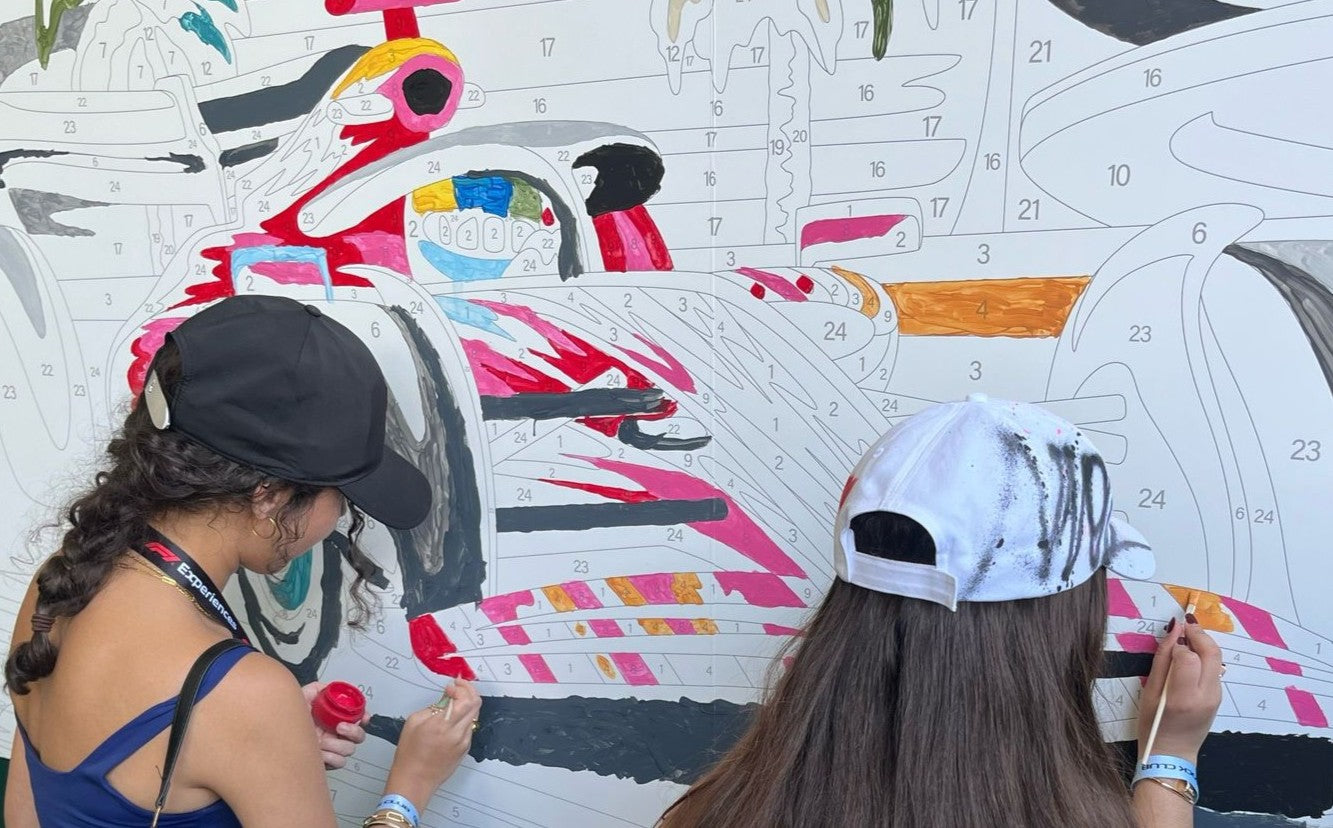 Completed paint by number mural on display at a brand activation event